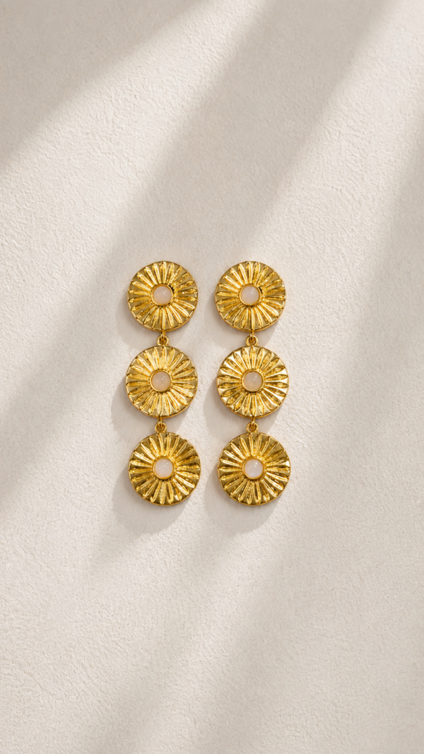 Aretes largos con centro de nácar