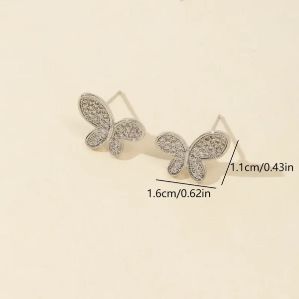 Aretes de mariposa color plateado con circonitas