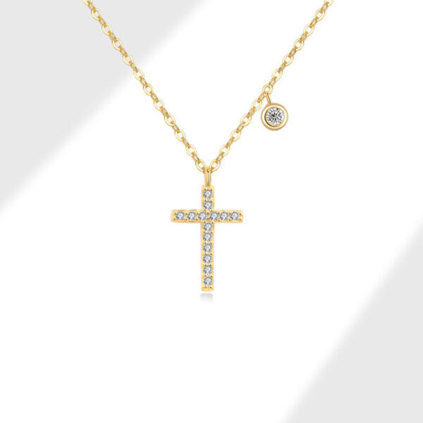 Cadena con dije de cruz y punto de luz baño de oro de 18K