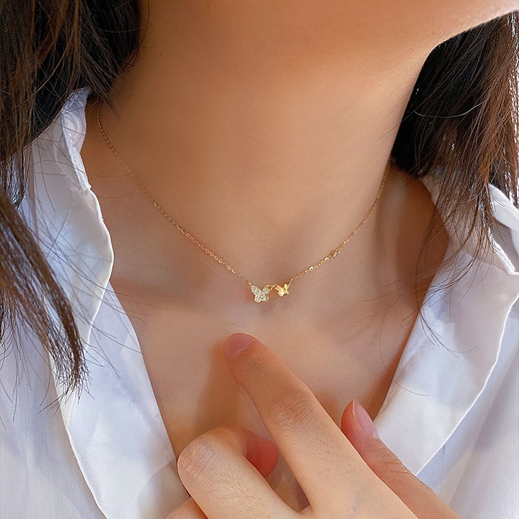 Cadena con dije de mariposa y baño de oro de 18K-Plata 925-C0 Cadena con dije de mariposa y baño de oro 18K