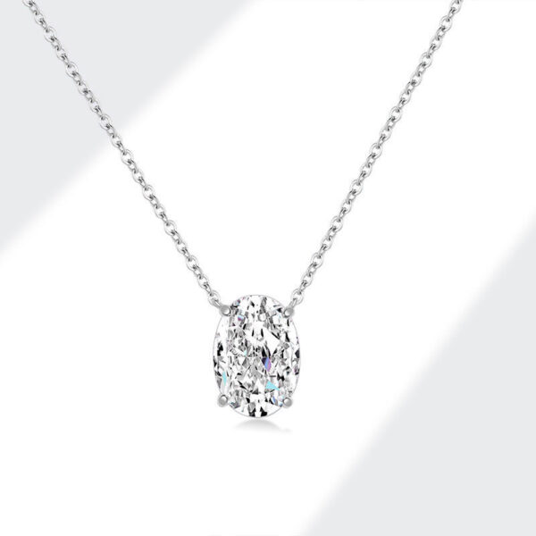 Cadena con dije de piedra grande y baño de oro blanco