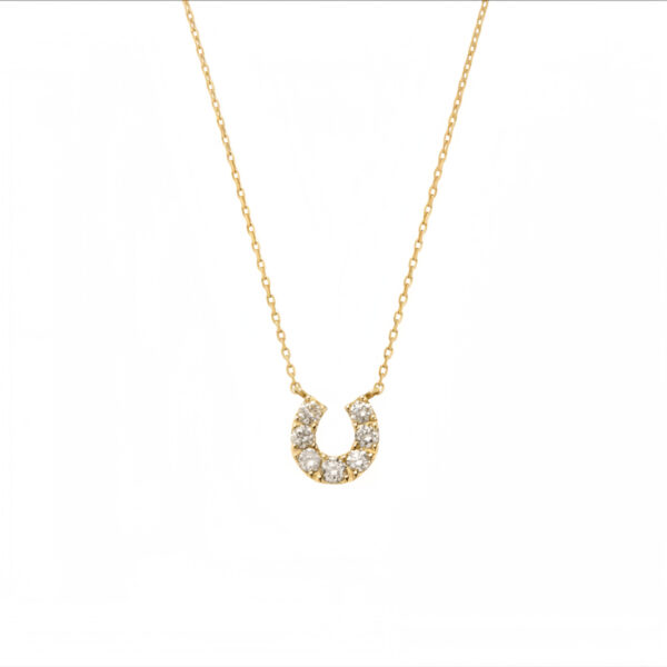 Cadena con dije de herradura circonitas y baño de oro 18K