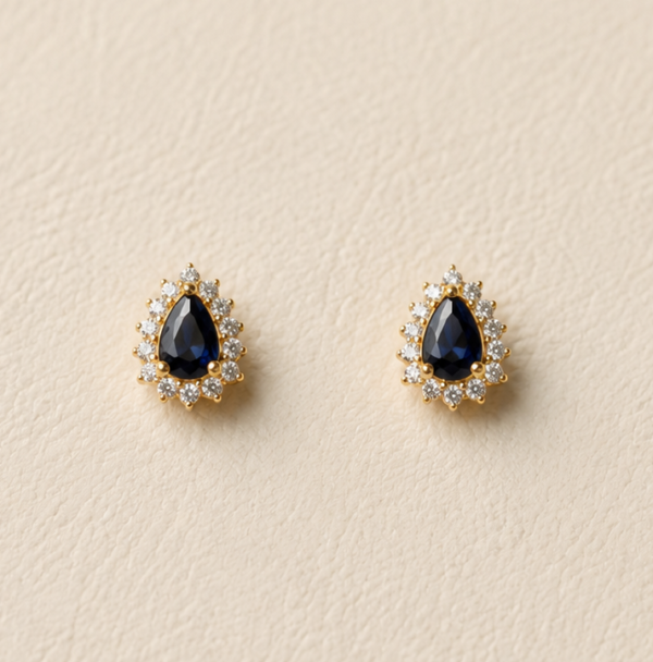 Aretes de gota con piedra oscura y baño de oro de 18K