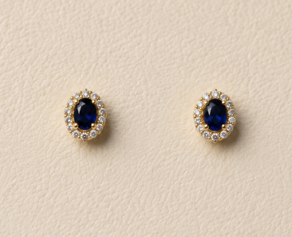 Aretes con piedra zafiro imitación y baño de oro de 18K