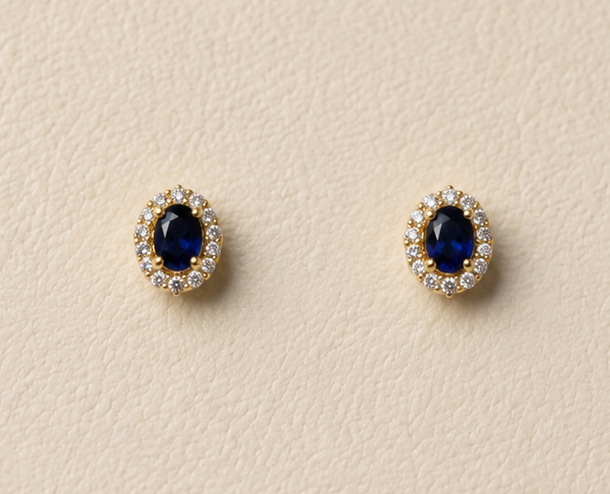 Aretes con piedra zafiro imitación y baño de oro de 18K