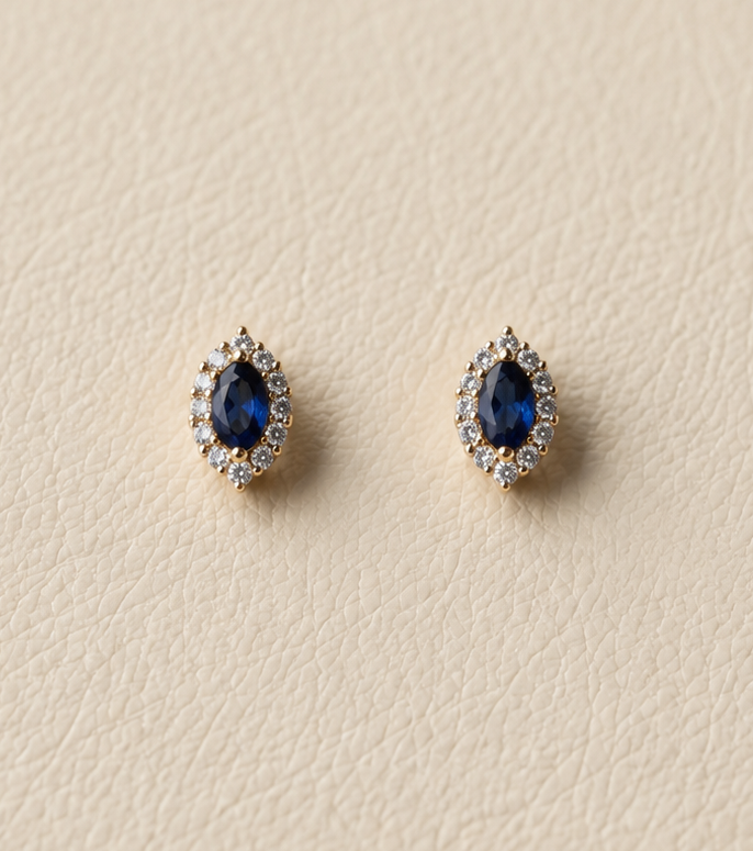 Aretes con piedra imitación zafiro y baño de oro de 18K