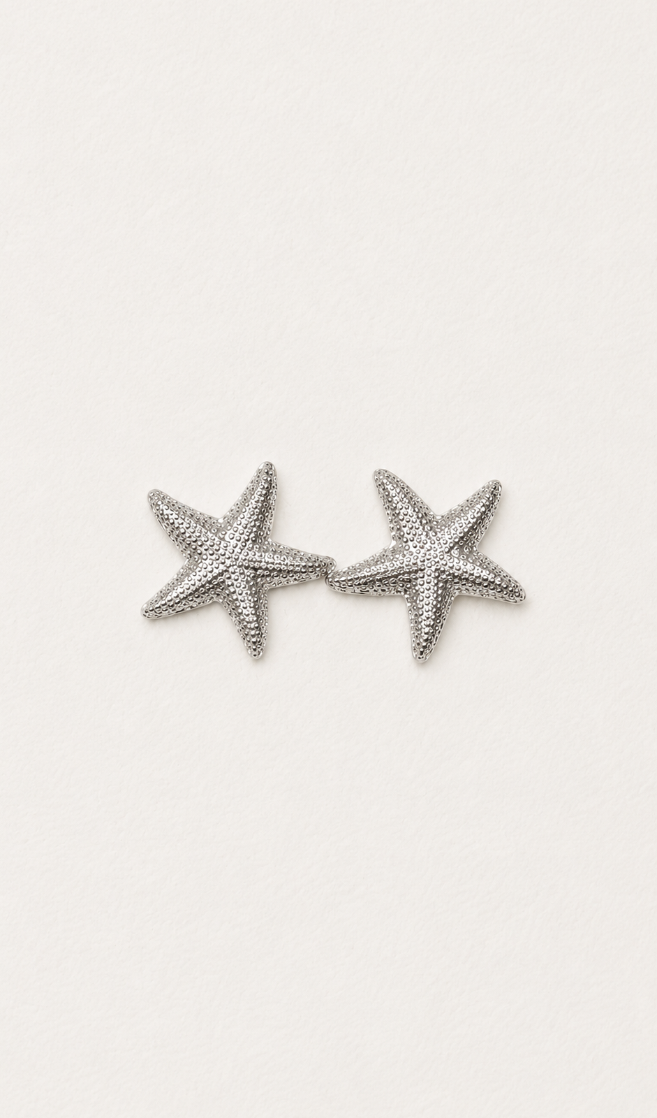 IMG_4494 Aretes de estrella de mar color plateado