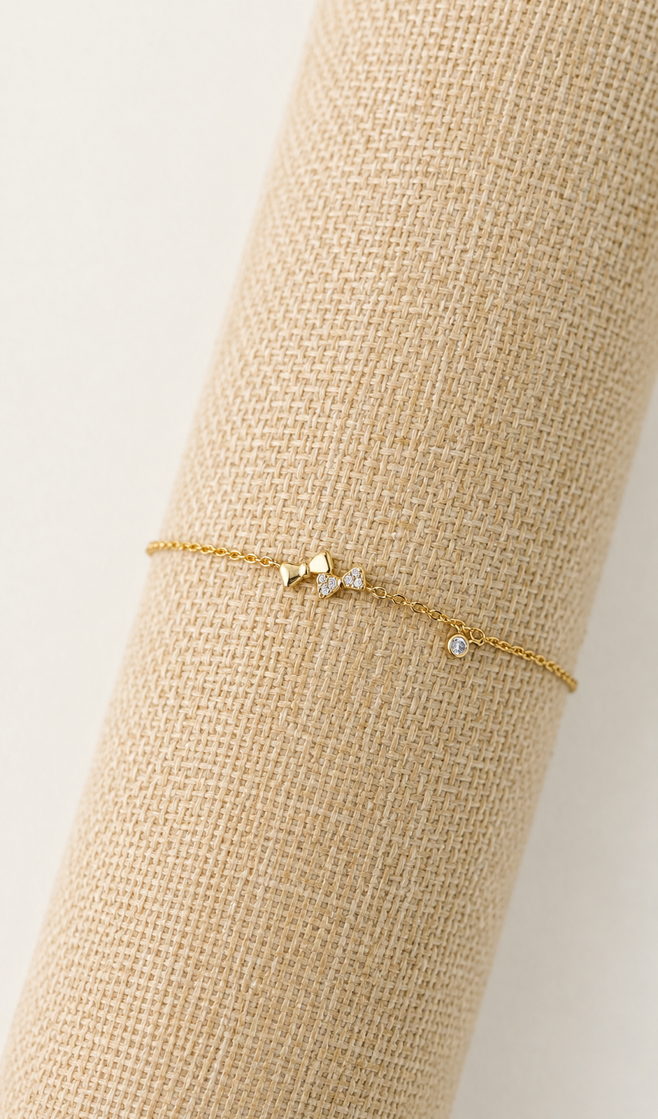 IMG_4534 Pulsera con dije de lazo y baño de oro de 18K