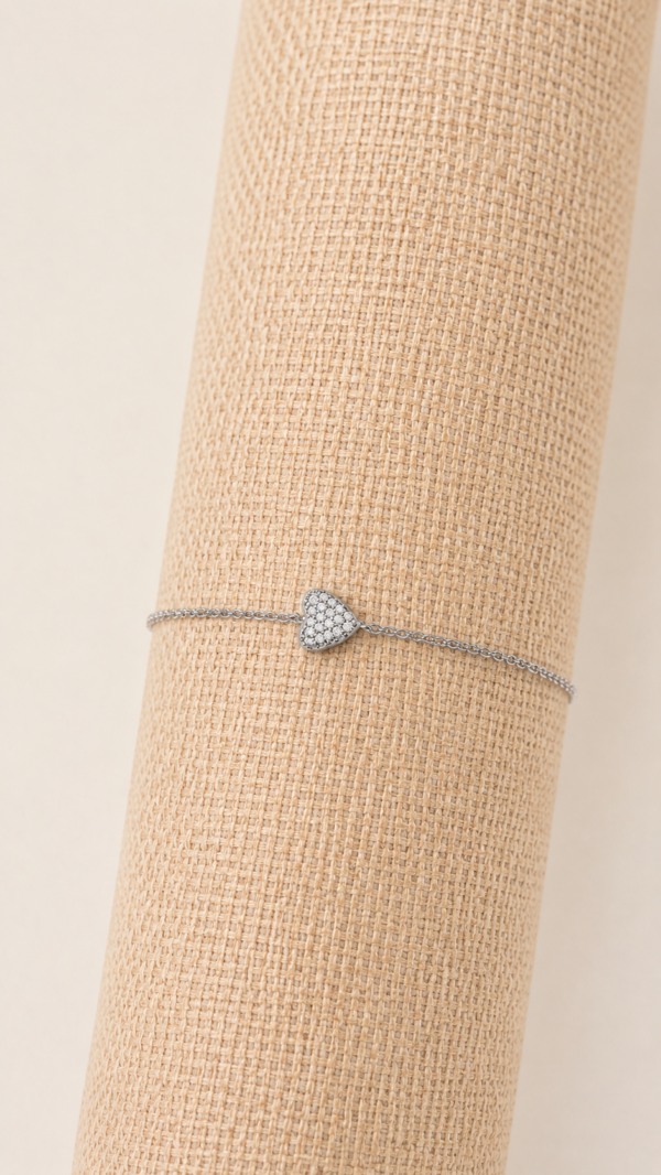 Pulsera de corazón con circonitas y baño de oro blanco