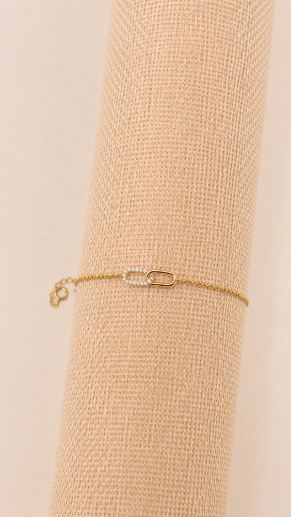 Pulsera con dije de infinito y baño de oro de 18K