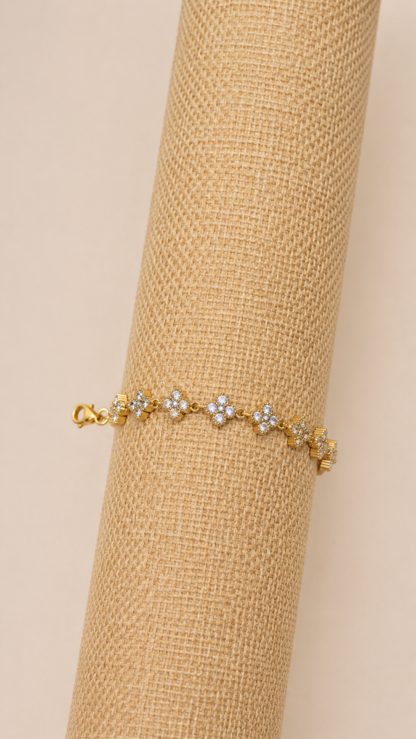 Pulsera de flores, baño de oro de 18K y circonitas