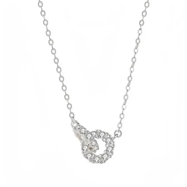 Pulsera con dije de círculos y circonitas baño de oro blanco