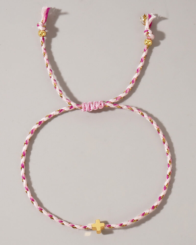 Pulsera de hilo rosa con blanco con dije de cruz
