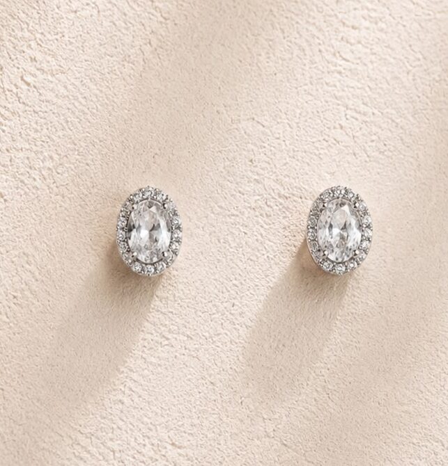 WhatsApp Image 2026-08-21 at 10.14.25 PM Aretes de piedra y circonitas con baño de oro blanco